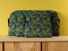 Galettes de chaise artisanales adaptées à une chaise Tolix, tissu vert jungle et léopards