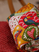 bouillotte sèche micro-ondes aux graines de lin bio, remède de grand-mère naturel pour soulager les petits maux du quotidien, tissu patchwork toucan