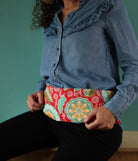 ceinture chauffante longue naturelle aux graines de lin bio, fabriquée en France, un accessoire écoresponsable pour soulager en douceur les petits maux du quotidien