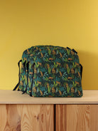 Galette de chaise Tolix sur mesure en tissu jungle vert avec motifs léopards, cousue artisanalement