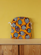 galette de chaise tolix A en tissu jaune