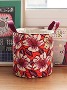 Panier rond Gága M Hibiscus en wax africain orange, vue de face