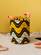 Petit panier rond Gága S Savane en wax africain jaune et marron, vue de face